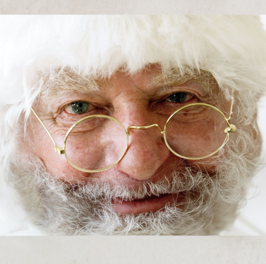 closeup picture of Santa looking at the camera for Santa pictures in Columbia, SC